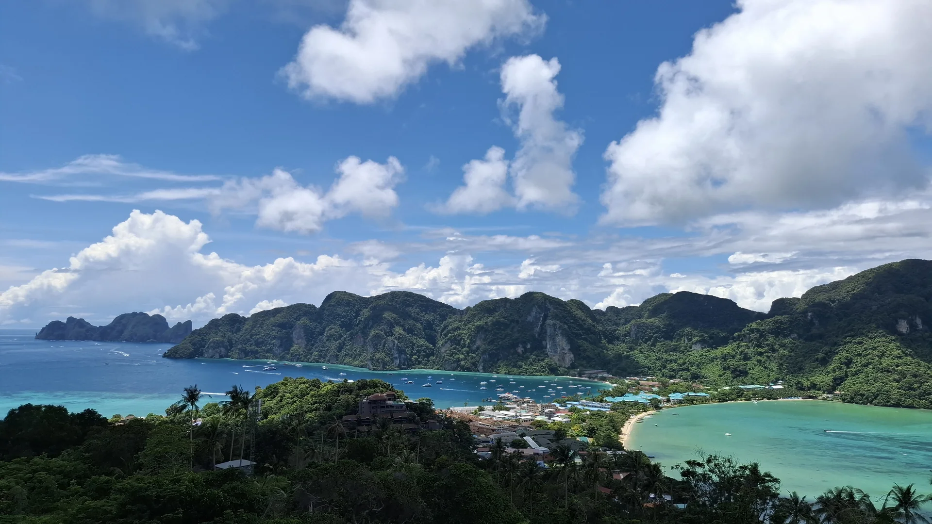 View across the green islands and turquoise bays of Phi Phi