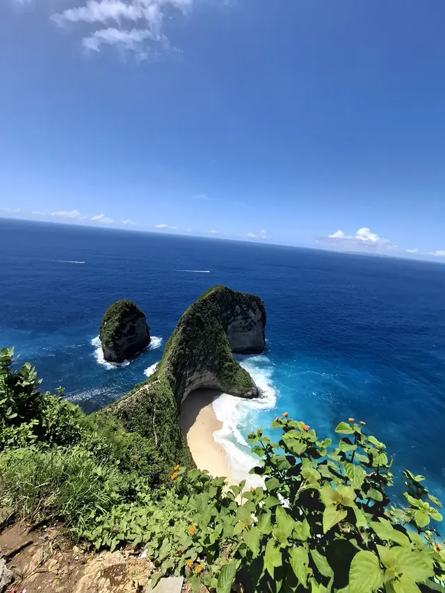 Green cliffs and blue water on Nusa Penida