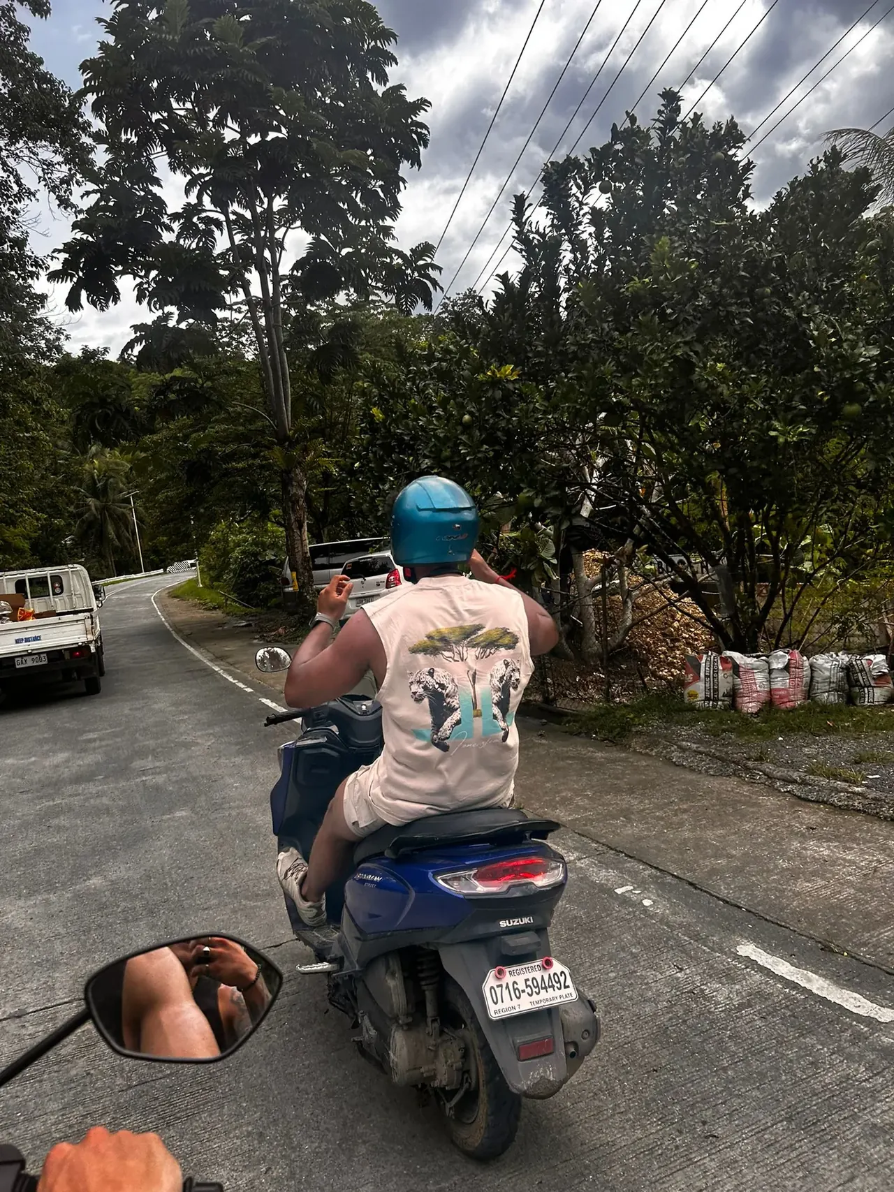 A scooter ride along an island road
