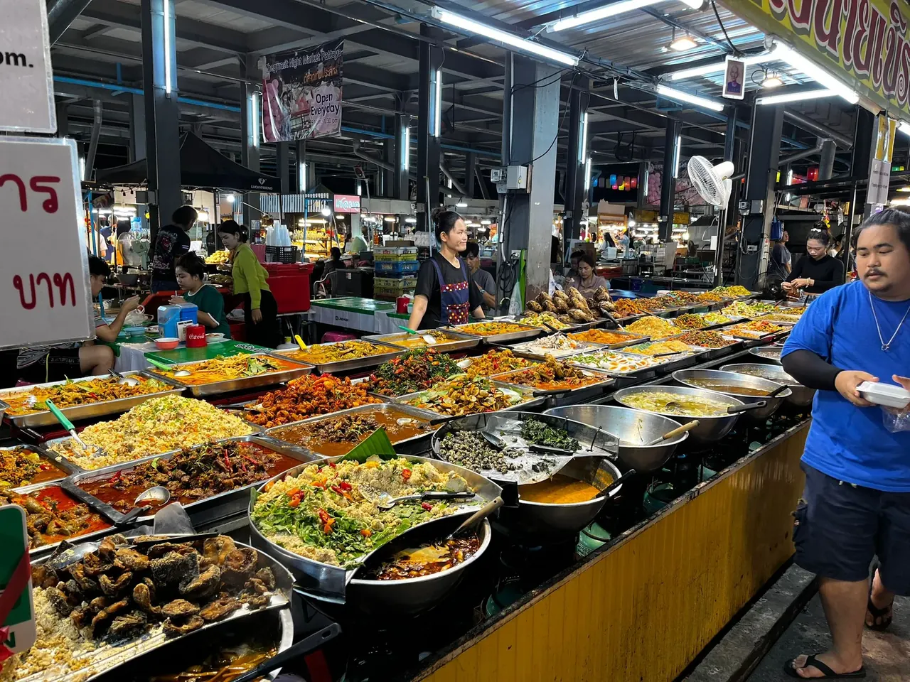 Colourful market stalls serving a wide choice of prepared food