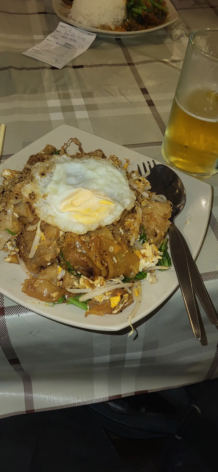 A local meal with noodles, egg and vegetables